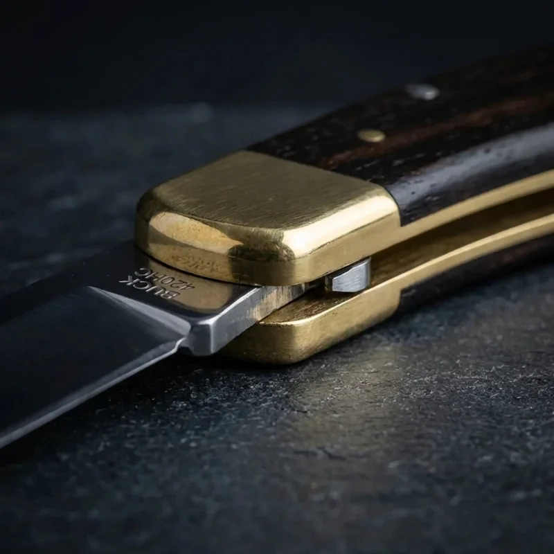 Buck 110 — Folding Hunter Pocket Knife 420HC Steel Ebony Dymondwood Brass Bolsters - 4